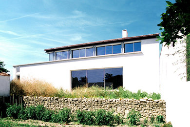 Idées déco pour une façade de maison classique.