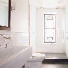 white tiled bathroom