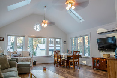 Sunroom - large transitional medium tone wood floor sunroom idea in Richmond with a skylight