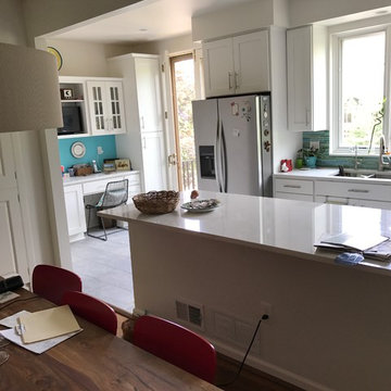kitchen remodel---white cabinets white and gray quartz, backsplash and flooring