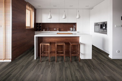 Example of a minimalist dining room design in Other