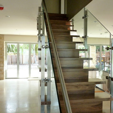 Walnut, stainless steel and glass staircase