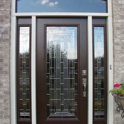 Arched Brick Doorway with Decorative Glass Door - Front Doors