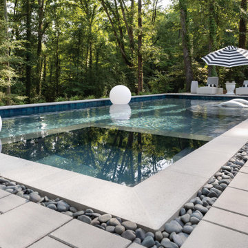 Staycation Traditional Backyard with Pavers and Cobblestone Inlay
