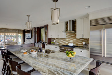 Large transitional single-wall porcelain tile eat-in kitchen photo in Chicago with an undermount sink, recessed-panel cabinets, white cabinets, quartzite countertops, multicolored backsplash, ceramic backsplash, stainless steel appliances and an island