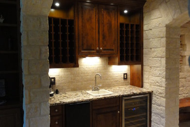 Example of a mountain style home design design in Austin