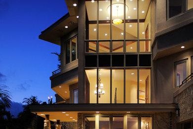 Example of a large island style exterior home design in Hawaii