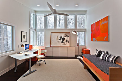 Family room - mid-sized contemporary enclosed dark wood floor family room idea in New York with white walls, no fireplace and no tv