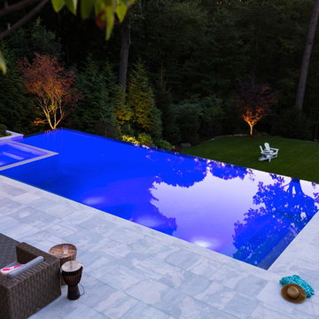 Luxury vanishing edge swimming pool and outdoor living area Ridgewood NJ