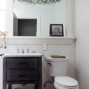 Transitional white tile and mosaic tile pink floor bathroom photo in San Francisco with flat-panel cabinets, black cabinets, a two-piece toilet, white walls, an undermount sink and white countertops