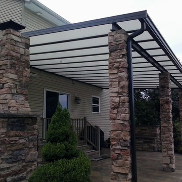 Attached Bronze Fixed Roof Structure in OH
