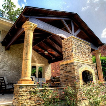 Grand home addition with outdoor kitchen see through fireplace - km