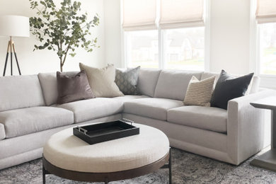 Example of a large transitional living room design in Nashville with beige walls