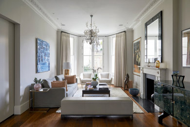 Photo of a large transitional living room in London.