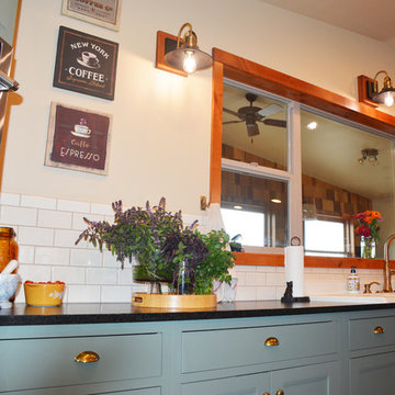 Love the lighting she chose for her sink and window wall.