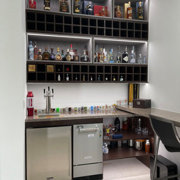 Architectural Millwork + Wall Paneling with Hidden Door + Bar area
