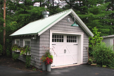 Design ideas for a mid-sized traditional detached garage in Boston.