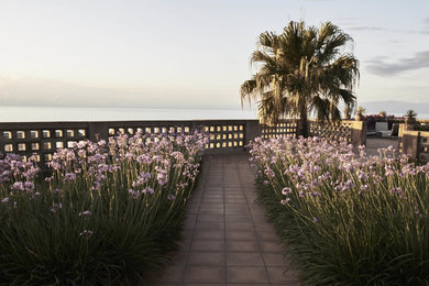 Inspiration for an expansive beach style deck in Naples with no cover.