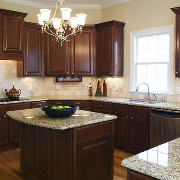 TV Drop Down in Traditional Kitchen