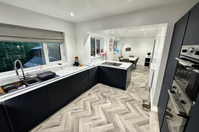 This is an example of a modern kitchen in Manchester.