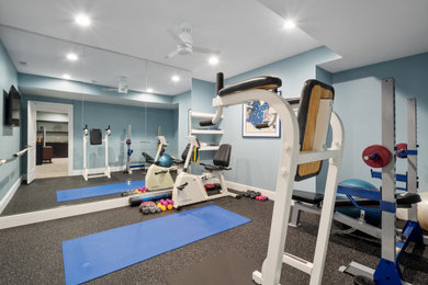 Photo of a contemporary home gym in St Louis.