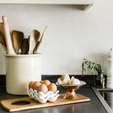 Elegantly Subtle Herringbone Stone Backsplash Mosaic