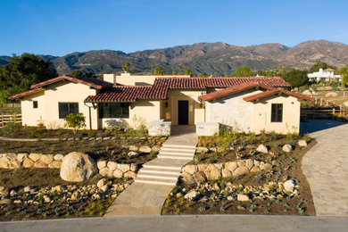Example of a trendy home design design in Santa Barbara