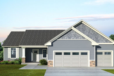 Example of a blue exterior home design in Grand Rapids