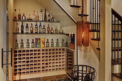 Example of a transitional wine cellar design in Detroit