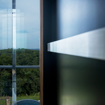 Custom Glass Elevator with power sliding glass doors