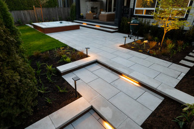 Patio - modern patio idea in Vancouver
