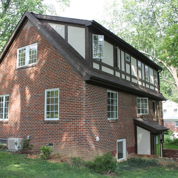 Tudor addition and detailed stucco siding