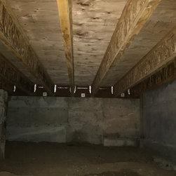 A peak into the crawl space. See the ventilation holes around the perimeter? - Products