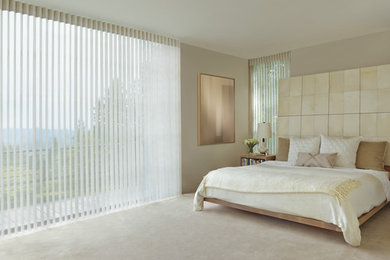 Example of a transitional bedroom design in Seattle