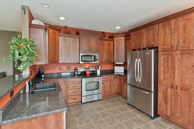 Example of a classic kitchen design in Other