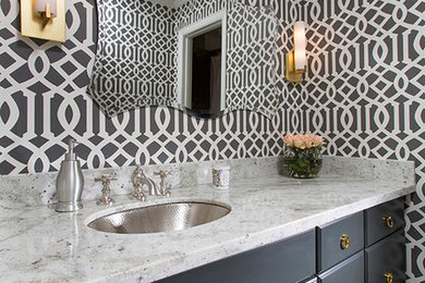 Example of a small transitional 3/4 gray tile and porcelain tile porcelain tile bathroom design in Houston with an undermount sink, gray walls, raised-panel cabinets, black cabinets and granite countertops
