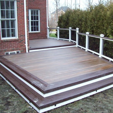 TREX TRANSCENDS SPICED RUM WITH VINTAGE LANTERN BORDER & WHITE TREX RAILING