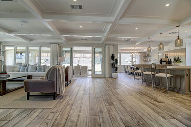 Living room - large open concept light wood floor living room idea in San Francisco
