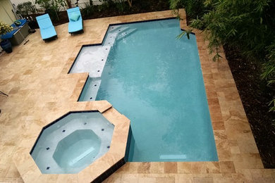 Pool - mid-sized contemporary pool idea in Jacksonville