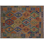 Bareens Designer Rugs - Bohemian Turkish Kilim Aretha Hand-Woven Wool Rug - 5'0'' x 6'6'' - Elevate the elegance of your home with this stunning hand-woven tribal Kilim wool rug. Meticulously crafted on a loom by the Nomad Turkman people using hand-spun wool and 100% natural vegetable dyes, these rugs are recognized for their repetitive geometric patterns, incorporating naturalistic floral and traditional designs. The contemporary fashion palette results in bold, sharp patterns that are incredibly versatile, as the pattern is the same on both sides. These reversible rugs feature a lighter shade on one side and brighter colors on the other, providing versatility according to preference. These unique rugs are made by knotting short strands of different colors onto the warps and securing them by tightly pressing the wefts. The designs are created by interweaving the various colored wefts and warps. Kilims are known for their exceptional durability and versatility, making them truly unique rugs.  Product Details    Rug Size: 5'0'' x 6'6''  Material: 100% Wool  Style: Kilim, Flat Weave, Dhurrie, Turkish, Southwestern, Rustic, Tribal  Colors: Brown, Blue, Purple, Orange  Weave Type: Hand-Woven, Handmade  Pile Height: Less than 0.25 inch