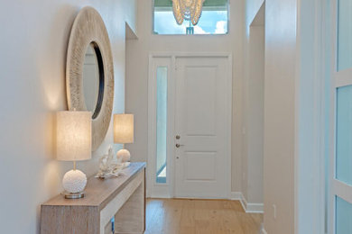 Example of a transitional entryway design in Miami