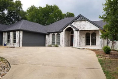 Transitional exterior home idea in Austin