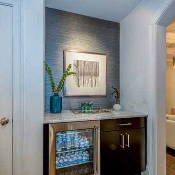 Beverage convenience to Living & Kitchen, with accent vinyl wallcovering.