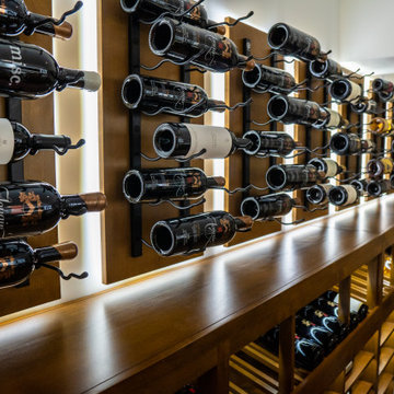 Modern Black Metal Racks Inside Luxury Custom Wine Cellar in Miami