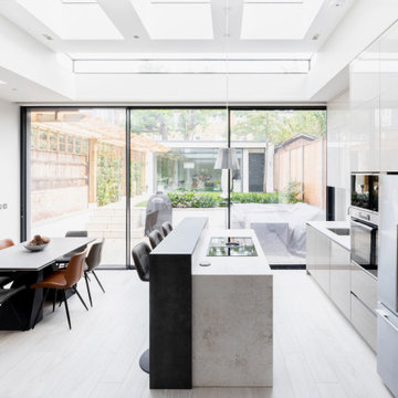 Light-filled & Minimal Kitchen, Dining & Seating Area, and Garden Studio