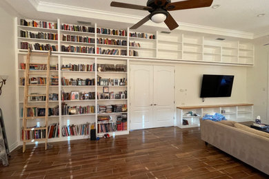 Example of a trendy family room design in Tampa