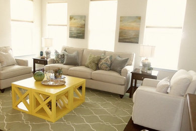 Inspiration for a large eclectic dark wood floor and brown floor living room remodel in Other with white walls, no fireplace and no tv