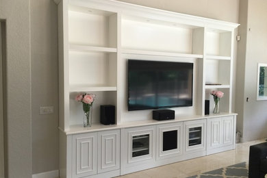 Inspiration for a contemporary home theater remodel in Miami