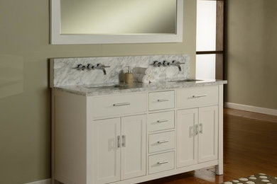 Example of a mid-sized classic bathroom design in Chicago with furniture-like cabinets, white cabinets, an undermount sink and marble countertops