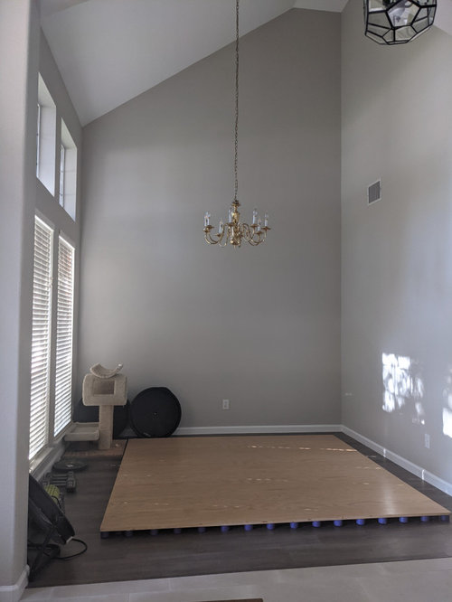 Turning 11'x11' high ceiling formal dining room into library?